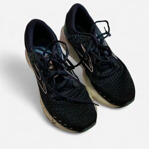 Lightly used Brooks women's running shoes in a hard-to-find Wide (D) fit.